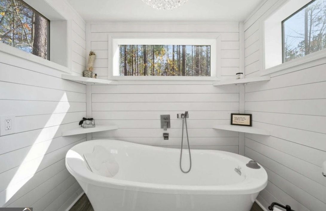 Spa soaking tub inside the container she shed
